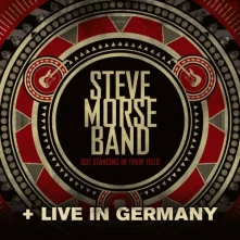 CD OUT STANDING IN THEIR FIELD