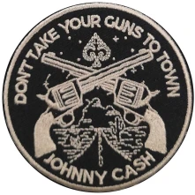 Johnny Cash, Nažehlovačka Don't Take Your Guns