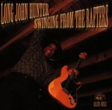 CD SWINGING FROM THE RAFTERS