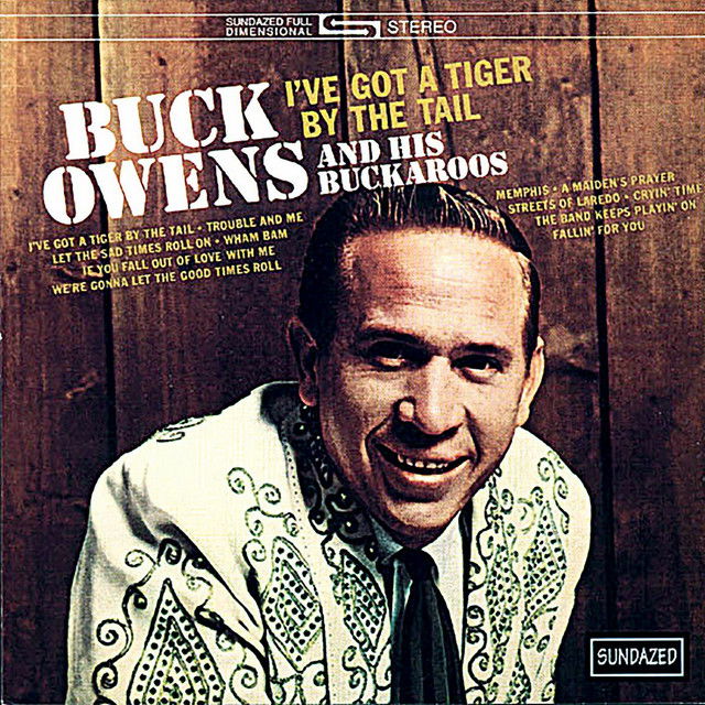 Vinyl Buck Owens - I'VE GOT A TIGER BY THE TAIL